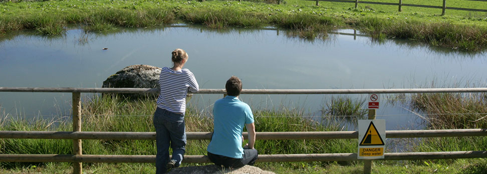 Couple by pond